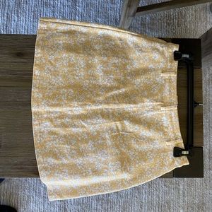 Yellow flower mini skirt